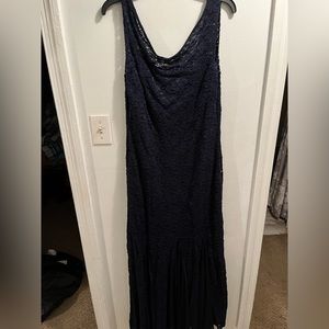 Women’s size 13/14 dress. Never worn. No tags. Ball gown length.